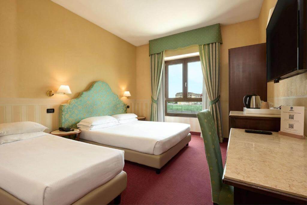 崔托恩貝斯特韋斯特酒店 Best Western Hotel Tritone四人房房間